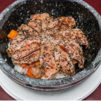 Tuna Rice · Seared tuna, shiitake mushrooms, over furikake rice, served on a hot stone bowl