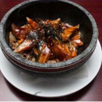 Unagi Don · Smoked broiled eel, shiitake mushrooms, over furikake rice, served on a hot stone bowl