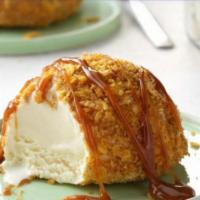 Fried Ice Cream · Deep fried ball of breaded ice cream 🍨 served with whipped cream, chocolate syrup, and rain...