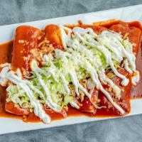 Enchilada Supreme · A combination of four enchiladas consisting of; marinated chicken, ground beef, shredded che...
