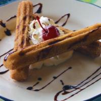 Churros · Traditional - mexican pastry, crusted in cinnamon and sugar. Served warm, drizzled in chocol...