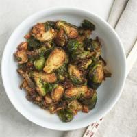 Szechuan Brussels Sprouts · Crispy brussels sprouts and housemade Szechuan chili oil.
