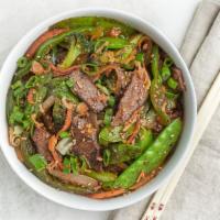 Chili Garlic Steak Rice Bowl · Charcoal-grilled top round, housemade chili garlic. Comes with mixed market vegetables and j...