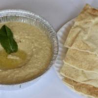 Hummus · Chickpeas blended with tahini sauce, garlic, and lemon juice to creamy perfection.