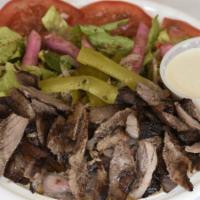Beef Shawerma · Tender marinated Angus beef, slow-cooked on a vertical rotisserie.

Consuming raw or underco...