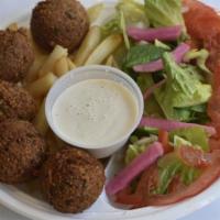Falafel Plate · Vegetarian. Ground chickpeas and fava beans, seasoned and fried to a crispy golden brown.