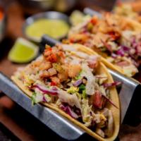 Crispy Shrimp · Chipotle slaw, pickled chiles, pineapple.  Served with Mexican rice & beans.  (contains glut...