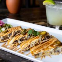 Quesadillas · mexican melted cheese, pico de gallo, chipotle mayo
cilantro, crema fresca