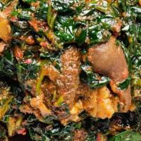 Efo Riro With Assorted Meat And Fish · served with Eba, Amala dudu,fufu, Iyan, Semo.