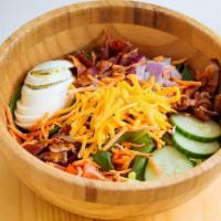Cobb Salad · Baby spinach, Tomato, Carrots, Cucumber, Hard boiled egg, Bacon, Shredded Cheddar Cheese