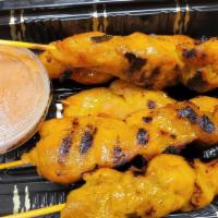Grilled Chicken Satay (5 Skewers) · Marinated chicken in skewers and grilled, served with slightly spicy peanut sauce.