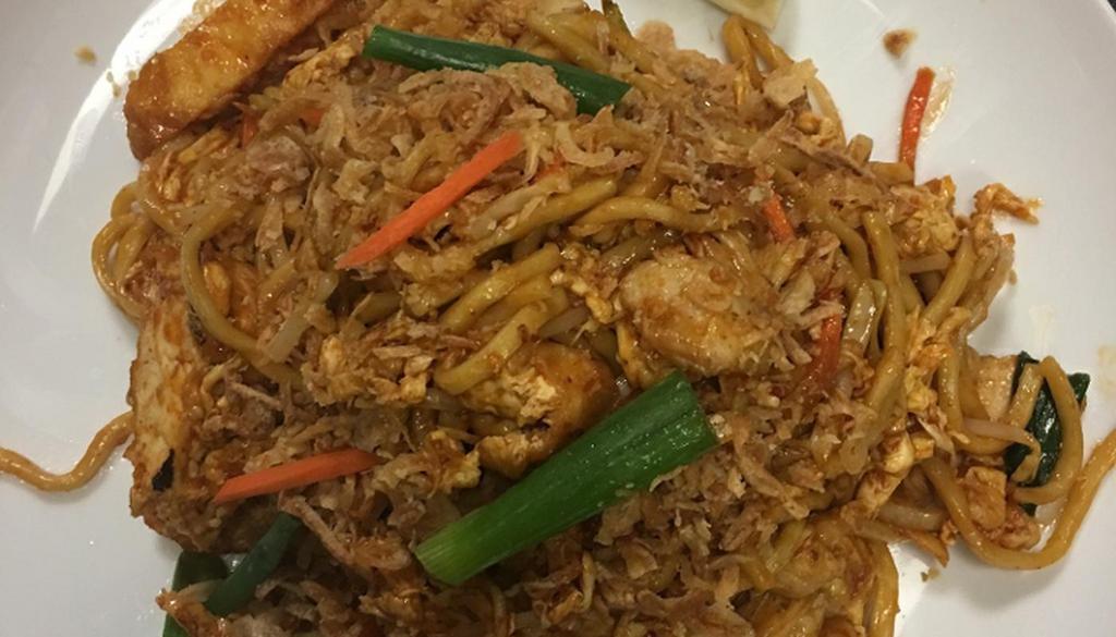 Malaysia Mee Goreng · Stir-fry egg noodles in home made sauce (medium spicy), cabbage, onion, tofu and bean sprout with choice of meats or vegetables.