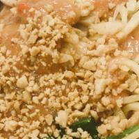 Peanut Noodles · Rice Vermicelli, chicken and bok choy with spicy potato curry and peanut sauce