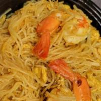 Singapore Noodle · Stir-fried rice vermicelli in curry flavored with shrimp, chicken, scallion, green chili and...