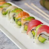 Rainbow Roll · Crab, avocado, cucumber, top with assort of fish.