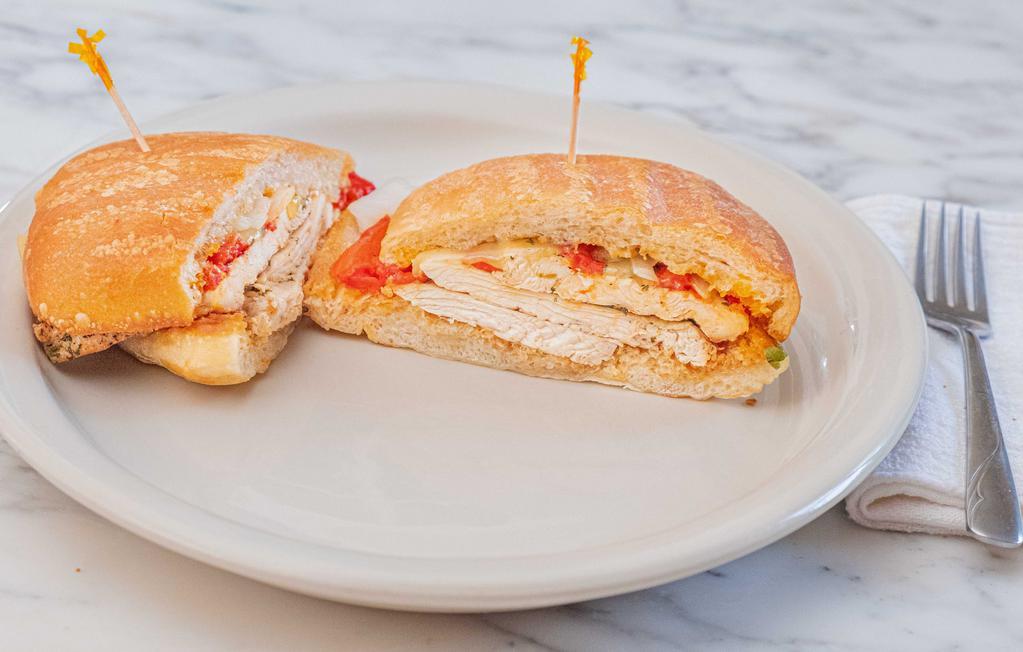 Tuscan Panini · Fresh mozzarella, roasted red peppers, and onion.
