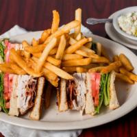 Turkey Club Sandwich · With bacon, lettuce and tomato.