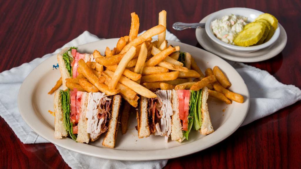 Turkey Club Sandwich · With bacon, lettuce and tomato.