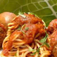 Italian Meatballs And Spaghetti · Jumbo Italian meatballs with Spaghetti pasta in homemade red sauce