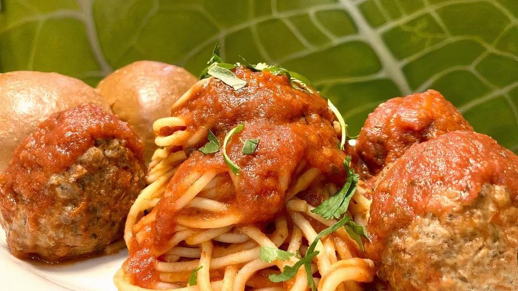 Italian Meatballs And Spaghetti · Jumbo Italian meatballs with Spaghetti pasta in homemade red sauce