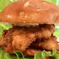 Jp Seafood Fish Sandwich · golden dipt fried white fish, lettuce, tomato, red onion, . burger sauce and tartar sauce se...