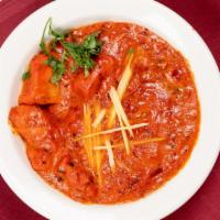 Achari Chicken  · Chicken cooked with onions, garlic, tomatoes, fresh chili pepper & flavored with pickled spi...