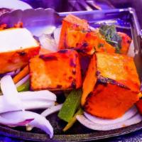 Paneer Tikka Masala · Homemade cottage cheese and bell peppers cooked in creamy sauce with spices.