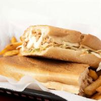 Chicken Chimi Dominicano (Dominican Sandwich) · With cabbage, mayo, ketchup, and green tomatoes.