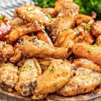 Chicken Wings Baked · Chicken marinated chef special spice and cook in clay oven.