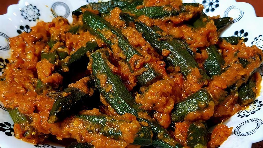 Bhindi Masala · Vegan, gluten-free. Stir-fried okra with tomato seasoning and stir-fried onions.
