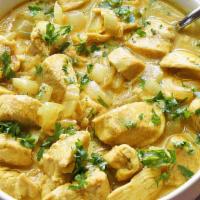 Coconut Chicken Curry · Gluten-free. Chicken breast cubes cooked with coconut milk, onion, and tomato sauce.