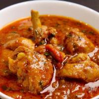 Chicken Curry · Gluten-free. Homestyle Northern Indian classic chicken dish cooked in thick curry sauce.