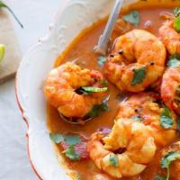 Shrimp Curry · Gluten-free. Shrimp cooked in onion and tomato sauce.
