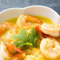 Coconut Shrimp Curry · Gluten-free. Shrimp cooked in coconut milk with onion and tomato sauce.
