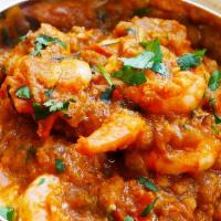 Shrimp Vindaloo · Gluten free, spicy. Gluten-free. Shrimp cooked in a spicy and tangy sauce with potatoes.