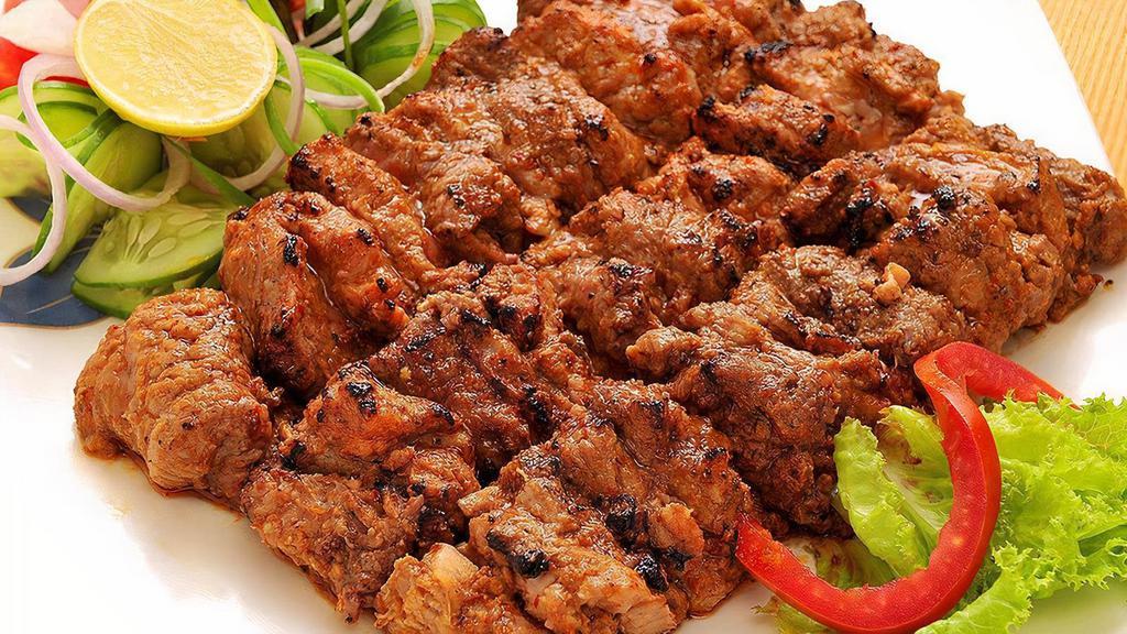 Beef Bihari Kabob · Gluten-free. Skewered pieces of beef tenders marinated in spice and cooked in clay oven.