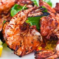 Tandoori Shrimp · Gluten-free. 16/20 size shrimp marinated in chef special spices and cooked in clay oven. Ser...
