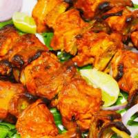 Chicken Tikka · Gluten-free. Yogurt marinated boneless chicken breast cubes cooked in a clay oven and served...