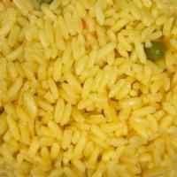 Yellow Rice · Yellow seasoned rice with mixed vegetables. / Arroz amarillo sazonado con vegetales mixtos.