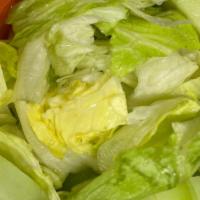 Fresh Salad / Ensalada Fresca · Cut fresh lettuce taping with slices tomatoes and cucumbers served with our dressing on the ...