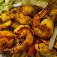 Delicious Chicken & Shrimp Fajita / Fajita De Pollo Y Camarón · Grilled pollo strips with shrimp cooked with green peppers and red peppers and onions.