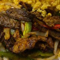 Delicious Steak Fajita / Fajita De Carne · Grilled steak strips cooked with green peppers and red peppers and onions.