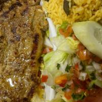 Delicious Tender Silvestre'S Steak / Carne Asada · Whole tender grilled new York steak with grilled onions.