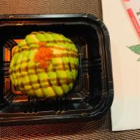 Avocado Blossom · Avocado wrapped with crunchy crab meat,creamy salad sauce,masago.Top with masago and eel sau...