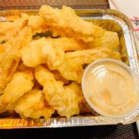 Rock Shrimp · Deep fried jumbo shrimp with fried sweet potato creamy spicy sauce on the side.