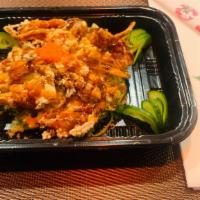Mango Soft Shell Crab Salad · Mango, crab meat, seaweed sand, avocado, lettuce and masago crunch on the bottom, soft shel ...