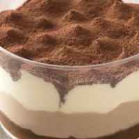 Tiramisu Cup · Coffee and zabaione cream on a layer of sponge cake soaked in espresso dusted with cocoa pow...