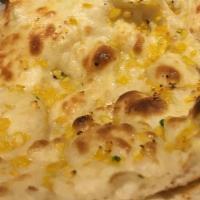 Garlic Naan · Bread topped with fresh garlic and herbs