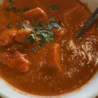 Chicken Tikka Masala  (G) · Boneless cubes of chicken broiled in the tandoor and cooked in a rich creamy tomato, onion s...