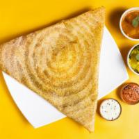 A Sight For Mysore Masala Dosa · Spiced crepe served with cooked potato, onion nuts lentils & cilantro